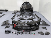 DRY CARBON BODY KIT with EXHAUST SYSTEM for LAMBORGHINI URUS SE 2024+ FORZA PERFORMANCE custom fit VENATUS SE buy
Set includes:

Front Bumper Assembly
Hood Bonnet
Hood Bonnet Trims
Front Fenders
Front Fender Flares
Front Fender Vents
Side Mirror Covers
Side Skirts
Rear Fenders
Rear Fender Flares
Roof Spoiler
Trunk Lid Wing Spoiler
Rear Diffuser
Exhaust System
Material: Dry Carbon

NOTE: Professional installation is required.