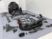 DRY CARBON BODY KIT with EXHAUST SYSTEM for LAMBORGHINI URUS SE 2024+ FORZA PERFORMANCE custom fit VENATUS SE buy
Set includes:

Front Bumper Assembly
Hood Bonnet
Hood Bonnet Trims
Front Fenders
Front Fender Flares
Front Fender Vents
Side Mirror Covers
Side Skirts
Rear Fenders
Rear Fender Flares
Roof Spoiler
Trunk Lid Wing Spoiler
Rear Diffuser
Exhaust System
Material: Dry Carbon

NOTE: Professional installation is required.