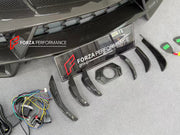 DRY CARBON BODY KIT with EXHAUST SYSTEM for LAMBORGHINI URUS SE 2024+ FORZA PERFORMANCE custom fit VENATUS SE buy
Set includes:

Front Bumper Assembly
Hood Bonnet
Hood Bonnet Trims
Front Fenders
Front Fender Flares
Front Fender Vents
Side Mirror Covers
Side Skirts
Rear Fenders
Rear Fender Flares
Roof Spoiler
Trunk Lid Wing Spoiler
Rear Diffuser
Exhaust System
Material: Dry Carbon

NOTE: Professional installation is required.