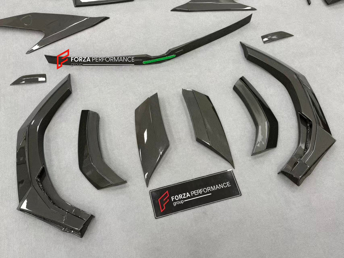DRY CARBON BODY KIT with EXHAUST SYSTEM for LAMBORGHINI URUS SE 2024+ FORZA PERFORMANCE custom fit VENATUS SE buy
Set includes:

Front Bumper Assembly
Hood Bonnet
Hood Bonnet Trims
Front Fenders
Front Fender Flares
Front Fender Vents
Side Mirror Covers
Side Skirts
Rear Fenders
Rear Fender Flares
Roof Spoiler
Trunk Lid Wing Spoiler
Rear Diffuser
Exhaust System
Material: Dry Carbon

NOTE: Professional installation is required.