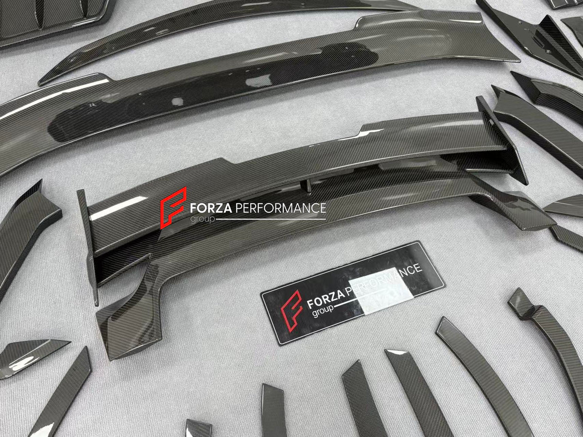 DRY CARBON BODY KIT with EXHAUST SYSTEM for LAMBORGHINI URUS SE 2024+ FORZA PERFORMANCE custom fit VENATUS SE buy
Set includes:

Front Bumper Assembly
Hood Bonnet
Hood Bonnet Trims
Front Fenders
Front Fender Flares
Front Fender Vents
Side Mirror Covers
Side Skirts
Rear Fenders
Rear Fender Flares
Roof Spoiler
Trunk Lid Wing Spoiler
Rear Diffuser
Exhaust System
Material: Dry Carbon

NOTE: Professional installation is required.