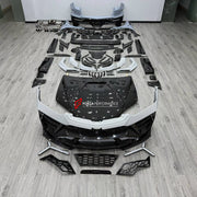 DRY CARBON BODY KIT for LAMBORGHINI URUS SE 2024+ FORZA PERFORMANCE custom fit Mansory Style

Set includes:
Front Lip
Front Bumper Assembly
Front Grille
Hood Bonnet
Fender Flares
Fenders
Side Skirts
Roof Spoiler
Ducktail Spoiler
Rear Spoiler Wing
Rear Bumper Assembly
Rear Diffuser
Exhaust System

Material: Dry Carbon

NOTE: Professional installation is required.