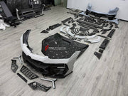 DRY CARBON BODY KIT for LAMBORGHINI URUS SE 2024+ FORZA PERFORMANCE custom fit Mansory Style

Set includes:
Front Lip
Front Bumper Assembly
Front Grille
Hood Bonnet
Fender Flares
Fenders
Side Skirts
Roof Spoiler
Ducktail Spoiler
Rear Spoiler Wing
Rear Bumper Assembly
Rear Diffuser
Exhaust System

Material: Dry Carbon

NOTE: Professional installation is required.