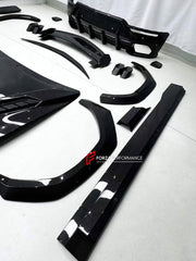 DRY CARBON BODY KIT for LAMBORGHINI URUS SE 2024+ FORZA PERFORMANCE custom fit U Style

Set includes:
Front Lip
Hood Bonnet
Fender Flares
Side Skirts
Roof Spoiler
Ducktail Spoiler
Rear Diffuser

Material: Dry Carbon

NOTE: Professional installation is required.