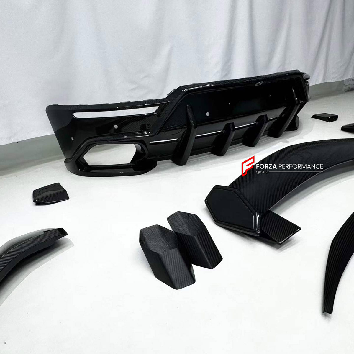 DRY CARBON BODY KIT for LAMBORGHINI URUS SE 2024+ FORZA PERFORMANCE custom fit U Style

Set includes:
Front Lip
Hood Bonnet
Fender Flares
Side Skirts
Roof Spoiler
Ducktail Spoiler
Rear Diffuser

Material: Dry Carbon

NOTE: Professional installation is required.