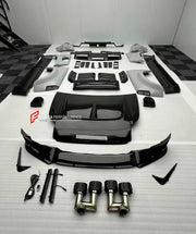 DRY CARBON BODY KIT for LAND ROVER DEFENDER L663 110 2020+

Set includes:

Front Lip
Front Bumper
Front Canards
Front Grille
Headlight Covers
Hood
Roof LED DRL Bar
Fender Flares
Side Mirror Covers
Door Panels
Side Skirts
Roof Spoiler
Tail Lights Covers
Rear Bumper
Rear Diffuser
Exhaust Tips
Spare Tire Cover
Material: Dry Carbon

Note: Professional installation is required.