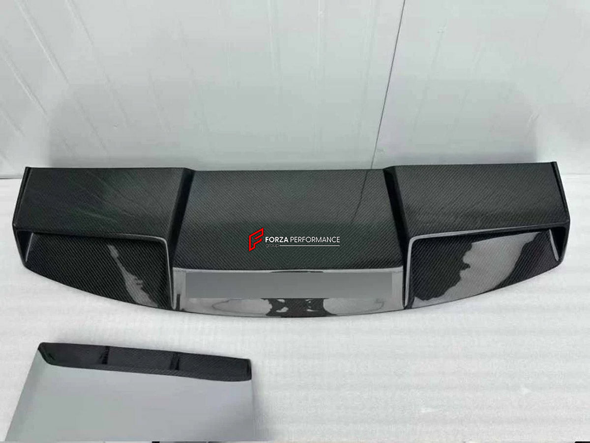 DRY CARBON BODY KIT for LAND ROVER DEFENDER L663 110 2020+

Set includes:

Front Lip
Front Bumper
Front Canards
Front Grille
Headlight Covers
Hood
Roof LED DRL Bar
Fender Flares
Side Mirror Covers
Door Panels
Side Skirts
Roof Spoiler
Tail Lights Covers
Rear Bumper
Rear Diffuser
Exhaust Tips
Spare Tire Cover
Material: Dry Carbon

Note: Professional installation is required.