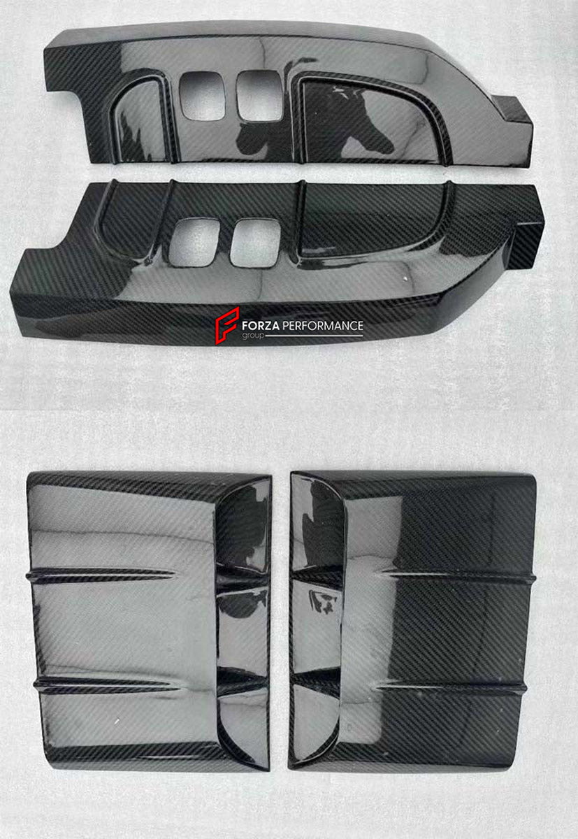 DRY CARBON BODY KIT for LAND ROVER DEFENDER L663 110 2020+

Set includes:

Front Lip
Front Bumper
Front Canards
Front Grille
Headlight Covers
Hood
Roof LED DRL Bar
Fender Flares
Side Mirror Covers
Door Panels
Side Skirts
Roof Spoiler
Tail Lights Covers
Rear Bumper
Rear Diffuser
Exhaust Tips
Spare Tire Cover
Material: Dry Carbon

Note: Professional installation is required.