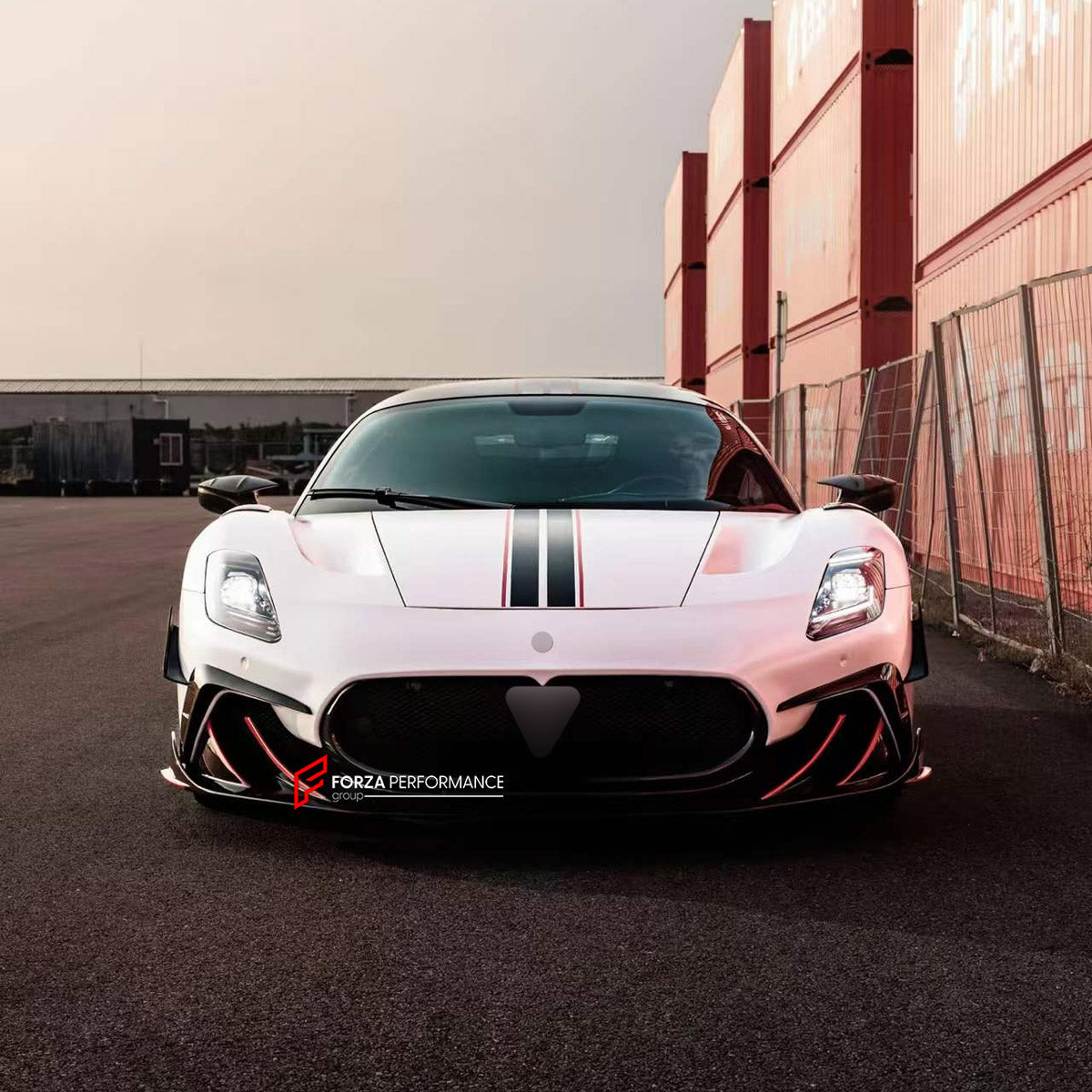 DRY CARBON BODY KIT for MASERATI MC20 2020+

Set includes:
Front Lip
Front Bumper Canards
Side Skirts
Ducktail Spoiler
Rear Diffuser

Material: Dry Carbon

NOTE: Professional installation is required.