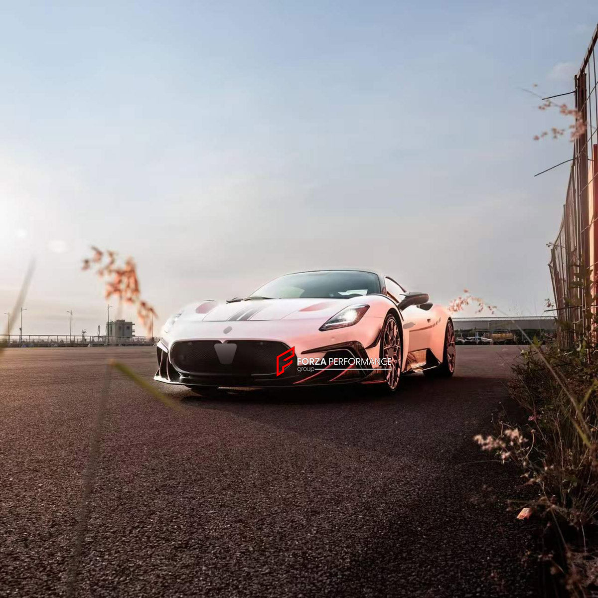 DRY CARBON BODY KIT for MASERATI MC20 2020+

Set includes:
Front Lip
Front Bumper Canards
Side Skirts
Ducktail Spoiler
Rear Diffuser

Material: Dry Carbon

NOTE: Professional installation is required.