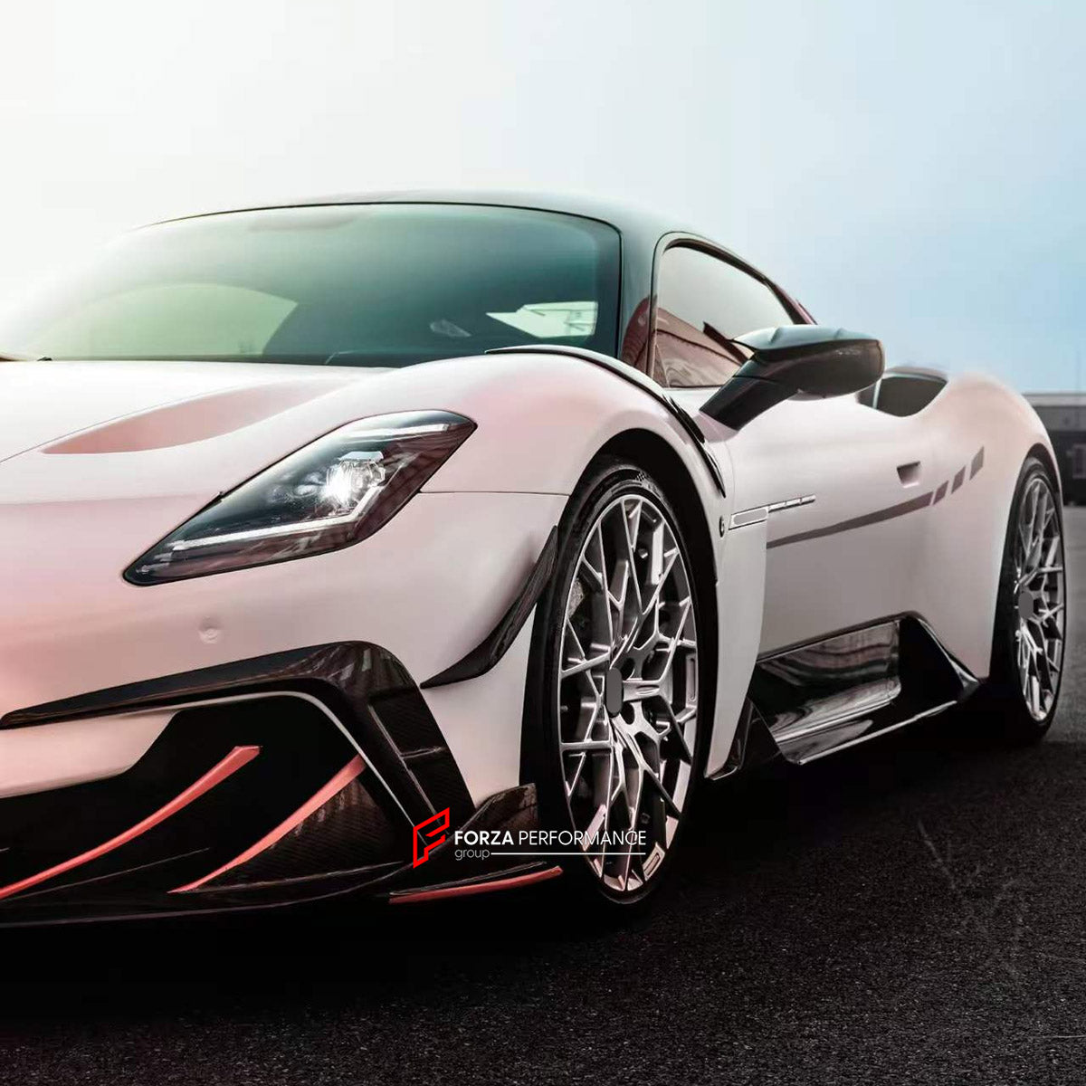 DRY CARBON BODY KIT for MASERATI MC20 2020+

Set includes:
Front Lip
Front Bumper Canards
Side Skirts
Ducktail Spoiler
Rear Diffuser

Material: Dry Carbon

NOTE: Professional installation is required.