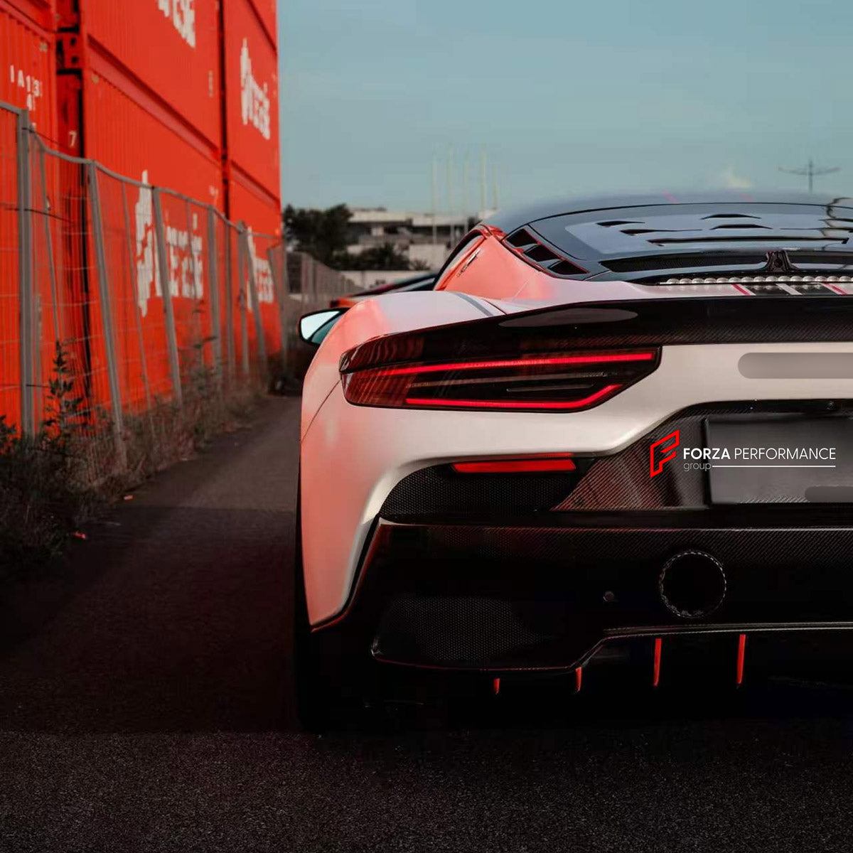 DRY CARBON BODY KIT for MASERATI MC20 2020+

Set includes:
Front Lip
Front Bumper Canards
Side Skirts
Ducktail Spoiler
Rear Diffuser

Material: Dry Carbon

NOTE: Professional installation is required.