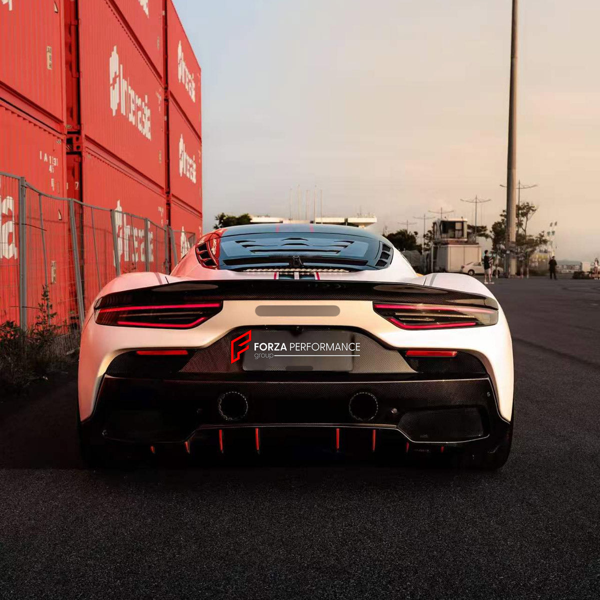 DRY CARBON BODY KIT for MASERATI MC20 2020+

Set includes:
Front Lip
Front Bumper Canards
Side Skirts
Ducktail Spoiler
Rear Diffuser

Material: Dry Carbon

NOTE: Professional installation is required.