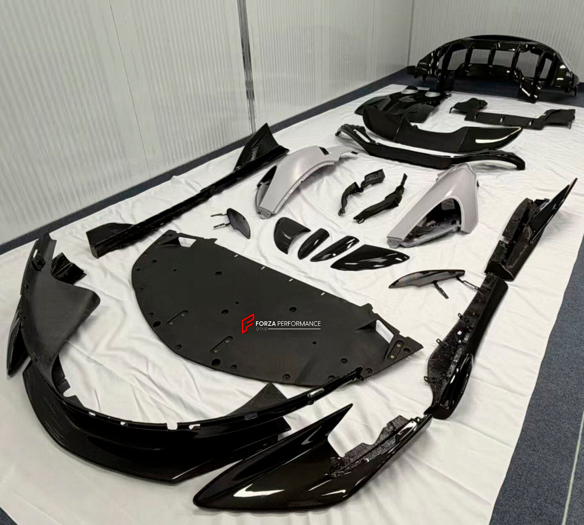 DRY CARBON BODY KIT for McLaren 600LT 2018+
Set includes:

Front Lip
Front Bumper
Side Skirts
Engine Cover Lid
Rear Spoiler Wing
Rear Diffuser
Rear Bumper
Material: Dry Carbon

NOTE: Professional installation is required.