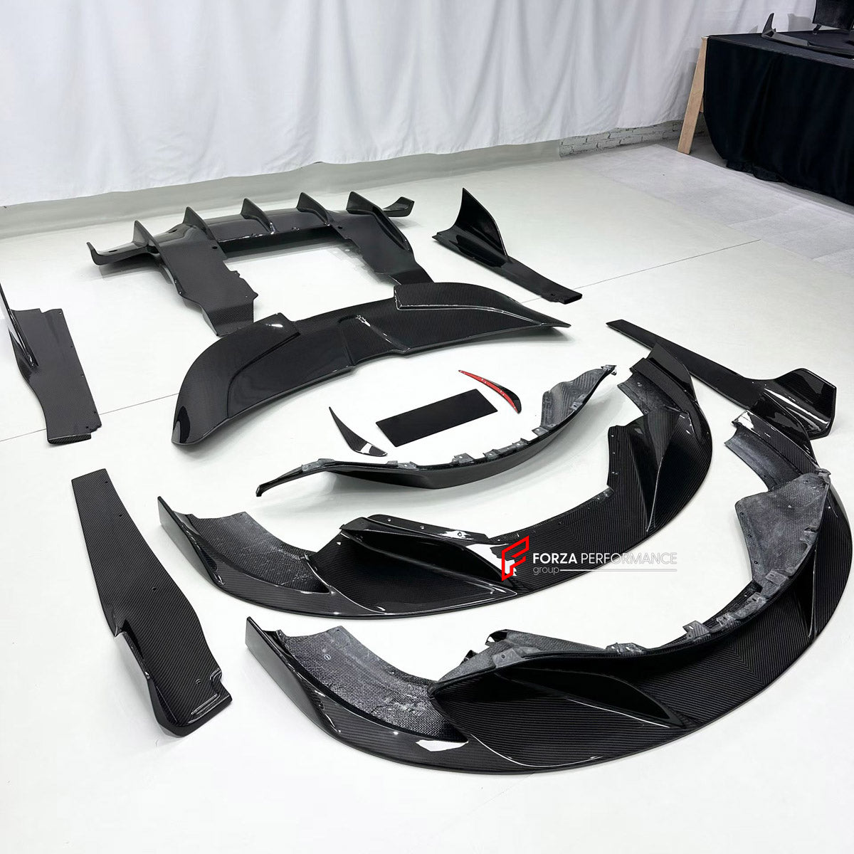 DRY CARBON BODY KIT for MCLAREN 720S COUPE 2017 - 2023

Set includes:
Front Lip
Front Bumper Canards
Side Skirts
Ducktail Spoiler
Rear Spoiler Wing
Rear Diffuser

Material: Dry Carbon

NOTE: Professional installation is required.