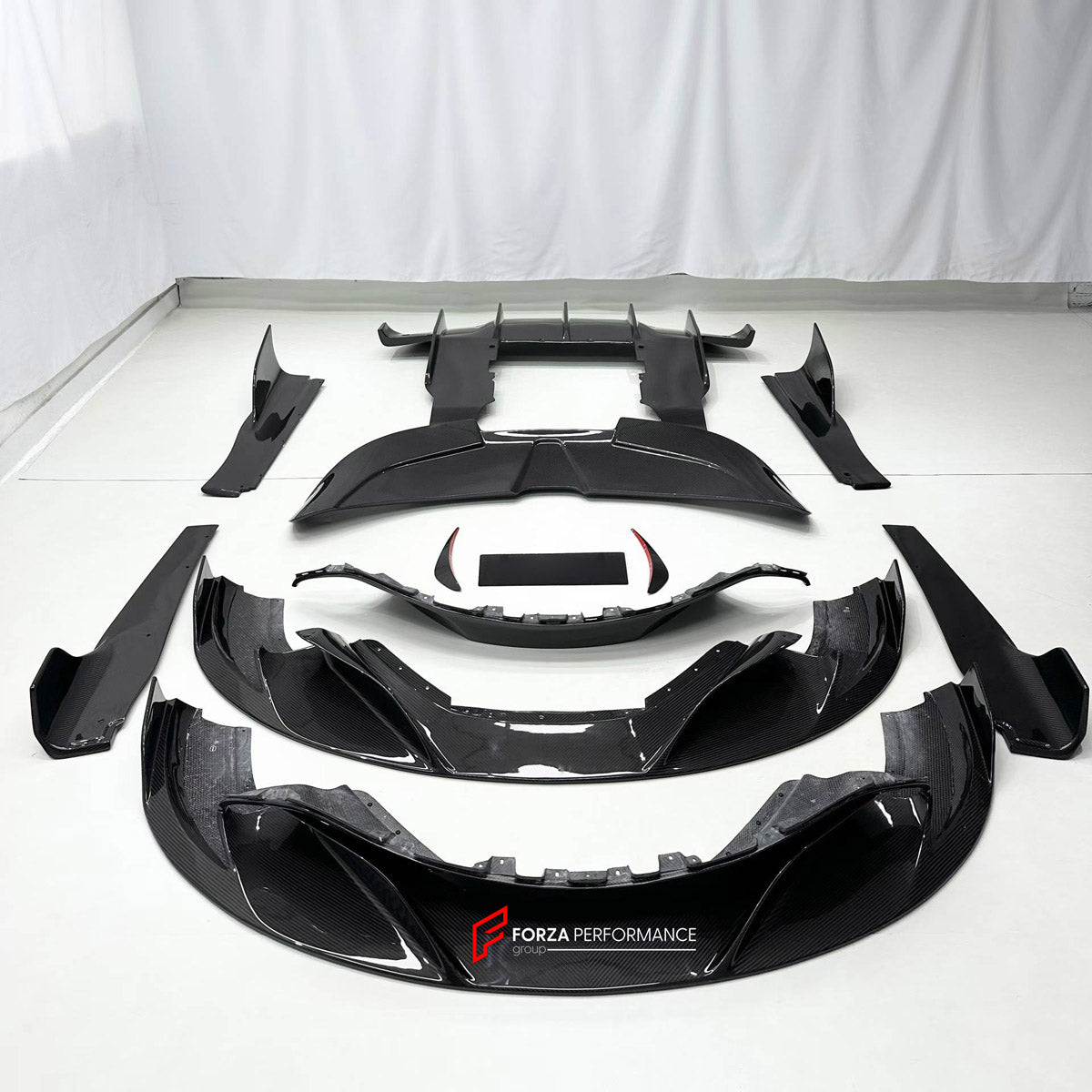 DRY CARBON BODY KIT for MCLAREN 720S COUPE 2017 - 2023

Set includes:
Front Lip
Front Bumper Canards
Side Skirts
Ducktail Spoiler
Rear Spoiler Wing
Rear Diffuser

Material: Dry Carbon

NOTE: Professional installation is required.