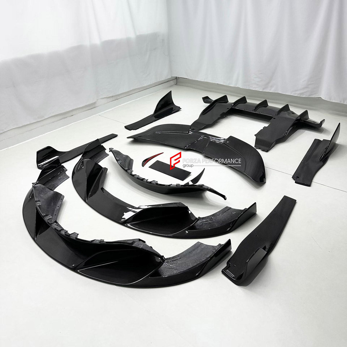 DRY CARBON BODY KIT for MCLAREN 720S COUPE 2017 - 2023

Set includes:
Front Lip
Front Bumper Canards
Side Skirts
Ducktail Spoiler
Rear Spoiler Wing
Rear Diffuser

Material: Dry Carbon

NOTE: Professional installation is required.