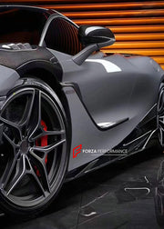 DRY CARBON BODY KIT for MCLAREN 720S COUPE 2017 - 2023 FORZA PERFORMANCE custom fit Black Sail Style

Set includes:
Front Lip
Front Bumper Canards
Front Fenders
Side Skirts
Rear Spoiler Wing
Rear Diffuser

Material: Dry Carbon

NOTE: Professional installation is required.