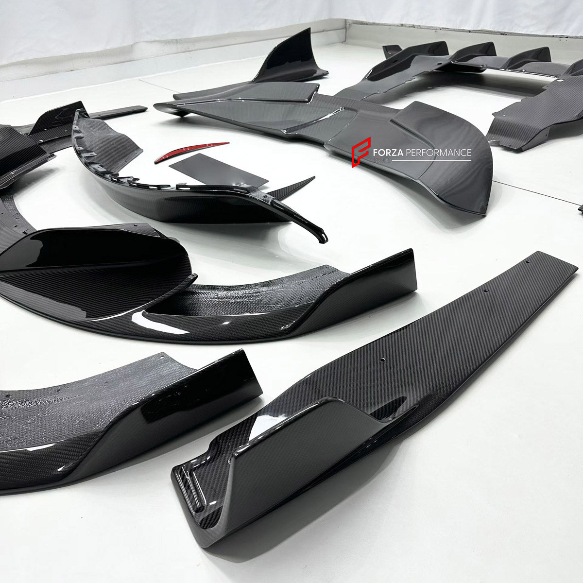 DRY CARBON BODY KIT for MCLAREN 720S COUPE 2017 - 2023

Set includes:
Front Lip
Front Bumper Canards
Side Skirts
Ducktail Spoiler
Rear Spoiler Wing
Rear Diffuser

Material: Dry Carbon

NOTE: Professional installation is required.