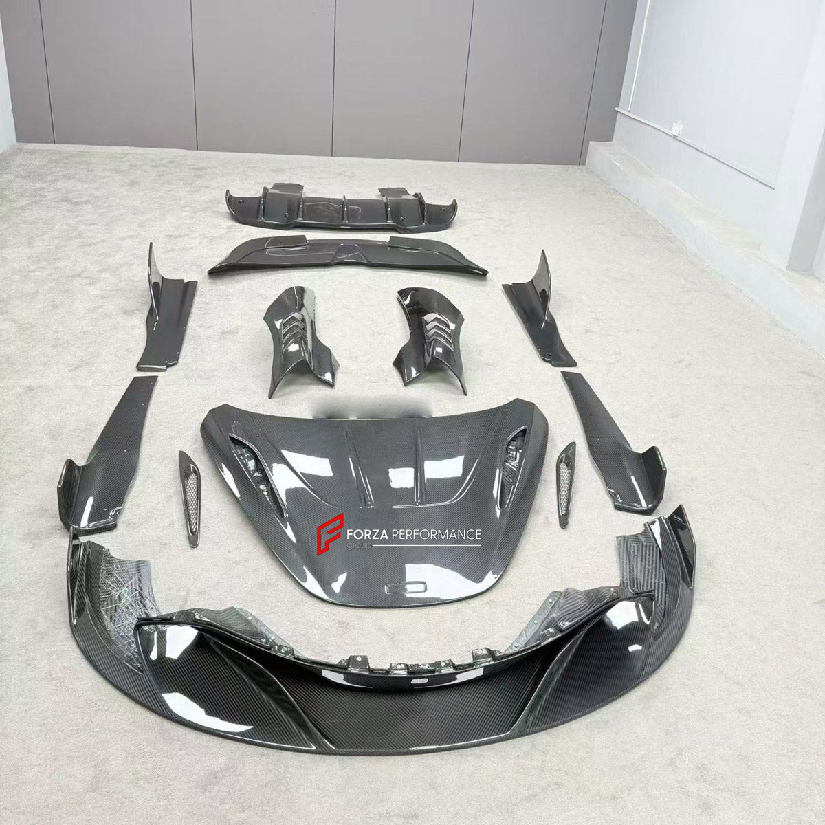 DRY CARBON BODY KIT for MCLAREN 720S COUPE 2017 - 2023 FORZA PERFORMANCE custom fit Ryft Style

Set includes:
Front Lip
Hood Bonnet
Front Fenders
Side Skirts
Rear Spoiler Wing
Rear Diffuser

Material: Dry Carbon

NOTE: Professional installation is required.