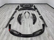 DRY CARBON BODY KIT for MCLAREN 720S COUPE 2017 - 2023 FORZA PERFORMANCE custom fit Black Sail Style

Set includes:
Front Lip
Front Bumper Canards
Front Fenders
Side Skirts
Rear Spoiler Wing
Rear Diffuser

Material: Dry Carbon

NOTE: Professional installation is required.