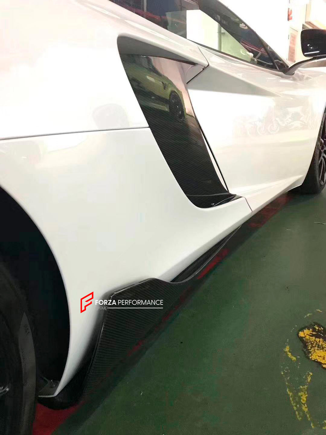 DRY CARBON BODY KIT for MCLAREN MP4-12C 2011 - 2014

Set includes:

Front Bumper Insert

Front Bumper Canards
Side Skirts
Side Air Vents Cover
Rear Spoiler
Rear Diffuser

Material: Dry Carbon

Note: Professional installation is required

CONTACT US FOR PRICING