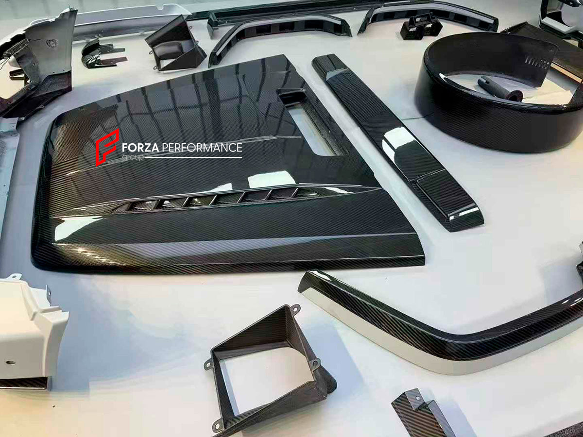 DRY CARBON BODY KIT FOR MERCEDES-BENZ G CLASS W464 W463A

Set includes:
Front Bumper Assembly
Front Bumper Trims
Hood
Side Fenders
Side Skirt
Spare Tire Cover
Rear Bumper

Material: Dry carbon fiber

NOTE: Professional installation is required