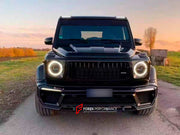 DRY CARBON BODY KIT FOR MERCEDES-BENZ G CLASS W464 W463A

Set includes:
Front Bumper Assembly
Front Bumper Trims
Hood
Side Fenders
Side Skirt
Spare Tire Cover
Rear Bumper

Material: Dry carbon fiber

NOTE: Professional installation is required