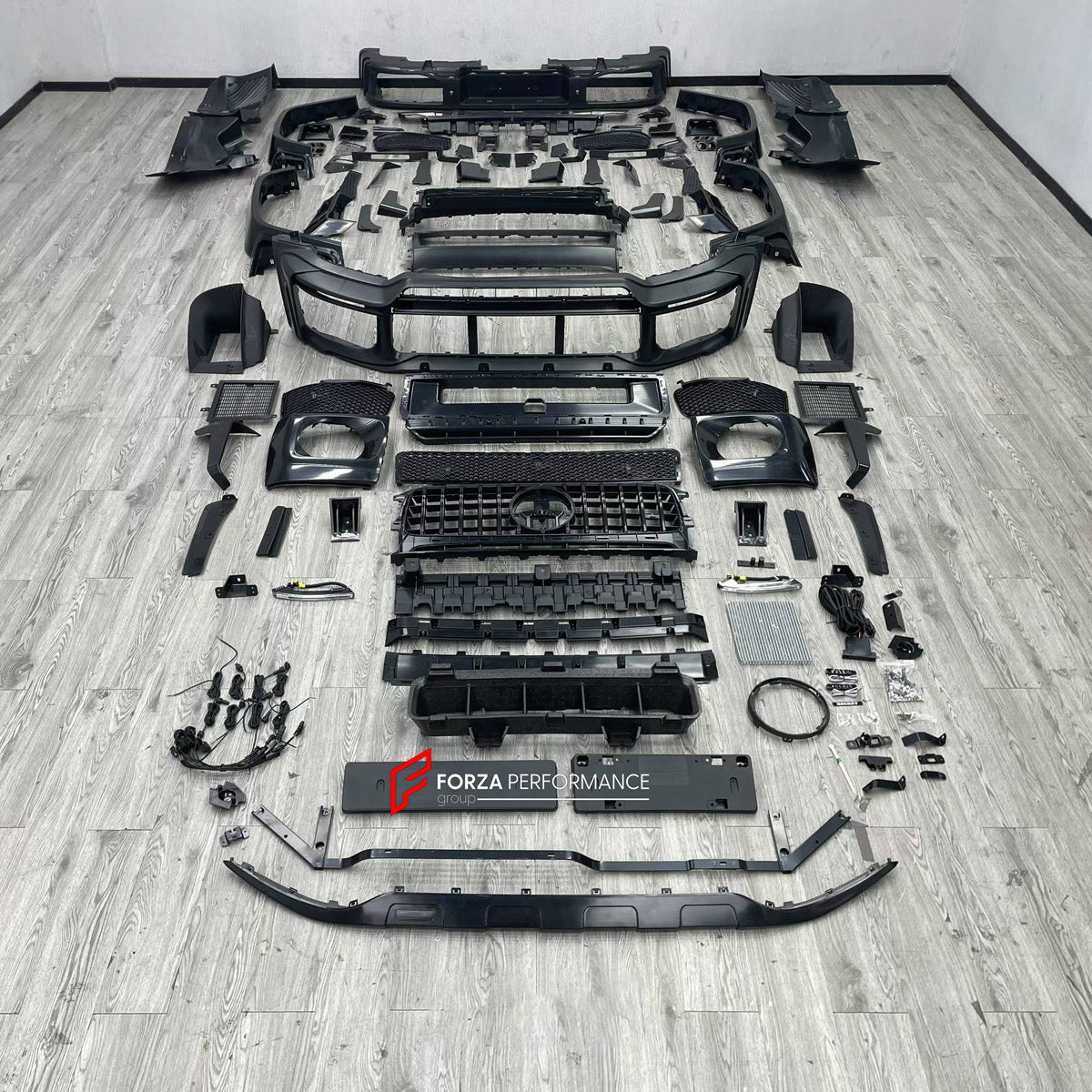 DRY CARBON BODY KIT for MERCEDES-BENZ G-CLASS W464 W465 2018+

Set includes:
Front Lip
Front Bumper Assembly
Front Grille
Fender Flares
Side Skirts
Rear Bumper Assembly
Rear Diffuser

Material: Dry Carbon, Plastic

NOTE: Professional installation is required.