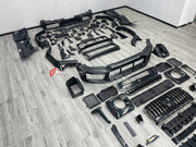 DRY CARBON BODY KIT for MERCEDES-BENZ G-CLASS W464 W465 2018+

Set includes:
Front Lip
Front Bumper Assembly
Front Grille
Fender Flares
Side Skirts
Rear Bumper Assembly
Rear Diffuser

Material: Dry Carbon, Plastic

NOTE: Professional installation is required.