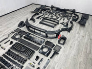 DRY CARBON BODY KIT for MERCEDES-BENZ G-CLASS W464 W465 2018+

Set includes:
Front Lip
Front Bumper Assembly
Front Grille
Fender Flares
Side Skirts
Rear Bumper Assembly
Rear Diffuser

Material: Dry Carbon, Plastic

NOTE: Professional installation is required.