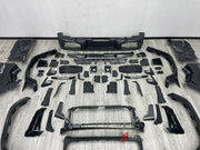 DRY CARBON BODY KIT for MERCEDES-BENZ G-CLASS W464 W465 2018+

Set includes:
Front Lip
Front Bumper Assembly
Front Grille
Fender Flares
Side Skirts
Rear Bumper Assembly
Rear Diffuser

Material: Dry Carbon, Plastic

NOTE: Professional installation is required.
