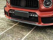 DRY CARBON BODY KIT for MERCEDES-BENZ G-CLASS W464 W465 2018+ FORZA PERFORMANCE custom fit B800 Style

Set includes:
Front Lip
Front Bumper
Front Bumper Canards
Front Bumper Air Vent Covers
Front Grille Mesh Cover Trims
Hood Bonnet
Roof Light Bar
Fender Flares
Fenders
Side Mirror Covers
Roof Spoiler
Rear Bumper
Rear Bumper Fins
Rear Diffuser
Spare Wheel Tire Cover

Material: Dry Carbon, Plastic

NOTE: Professional installation is required.