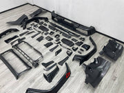 DRY CARBON BODY KIT for MERCEDES-BENZ G-CLASS W464 W465 2018+

Set includes:
Front Lip
Front Bumper Assembly
Front Grille
Fender Flares
Side Skirts
Rear Bumper Assembly
Rear Diffuser

Material: Dry Carbon, Plastic

NOTE: Professional installation is required.