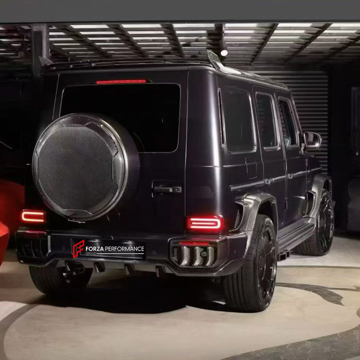 DRY CARBON BODY KIT for MERCEDES-BENZ G CLASS W464 W465 G63 G350 G500 2018+ FORZA PERFORMANCE custom fit Topcar Style

Set includes:
Front Bumper
Hood Bonnet
Front Fenders
Fender Flares
Side Steps
Rear Fenders
Rear Bumper
Rear Diffuser

Material: Dry Carbon

NOTE: Professional installation is required.