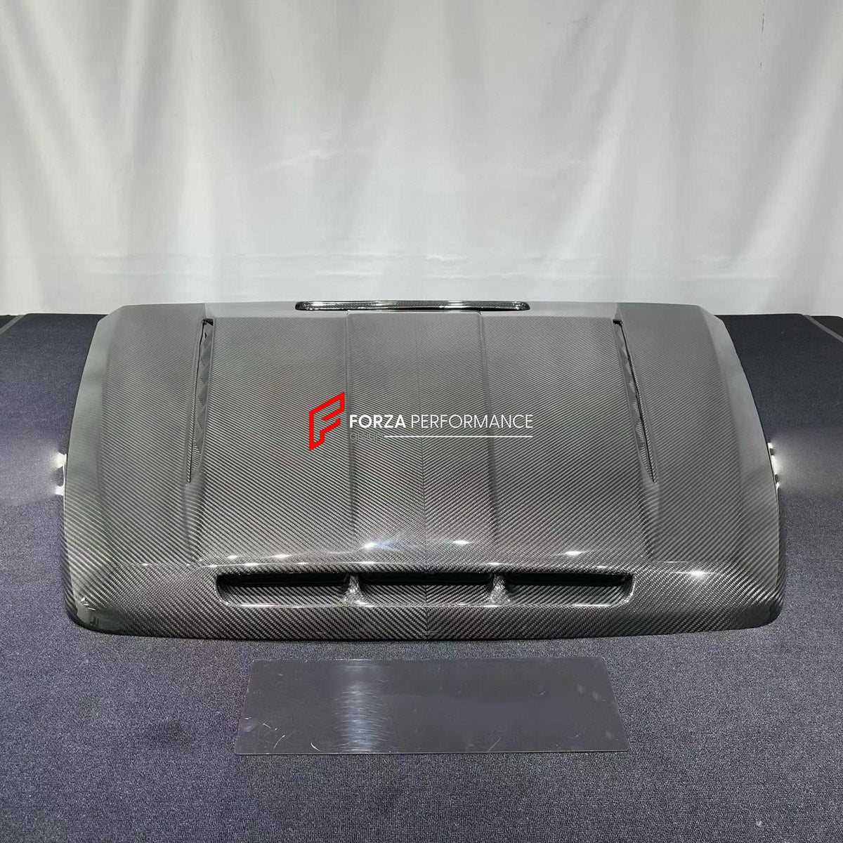 DRY CARBON BODY KIT for MERCEDES-BENZ G CLASS W464 W465 G63 G350 G500 2018+ FORZA PERFORMANCE custom fit Topcar Style

Set includes:
Front Bumper
Hood Bonnet
Front Fenders
Fender Flares
Side Steps
Rear Fenders
Rear Bumper
Rear Diffuser

Material: Dry Carbon

NOTE: Professional installation is required.