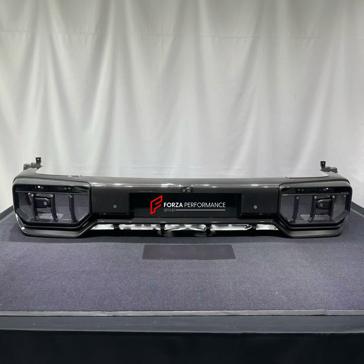 DRY CARBON BODY KIT for MERCEDES-BENZ G CLASS W464 W465 G63 G350 G500 2018+ FORZA PERFORMANCE custom fit Topcar Style

Set includes:
Front Bumper
Hood Bonnet
Front Fenders
Fender Flares
Side Steps
Rear Fenders
Rear Bumper
Rear Diffuser

Material: Dry Carbon

NOTE: Professional installation is required.