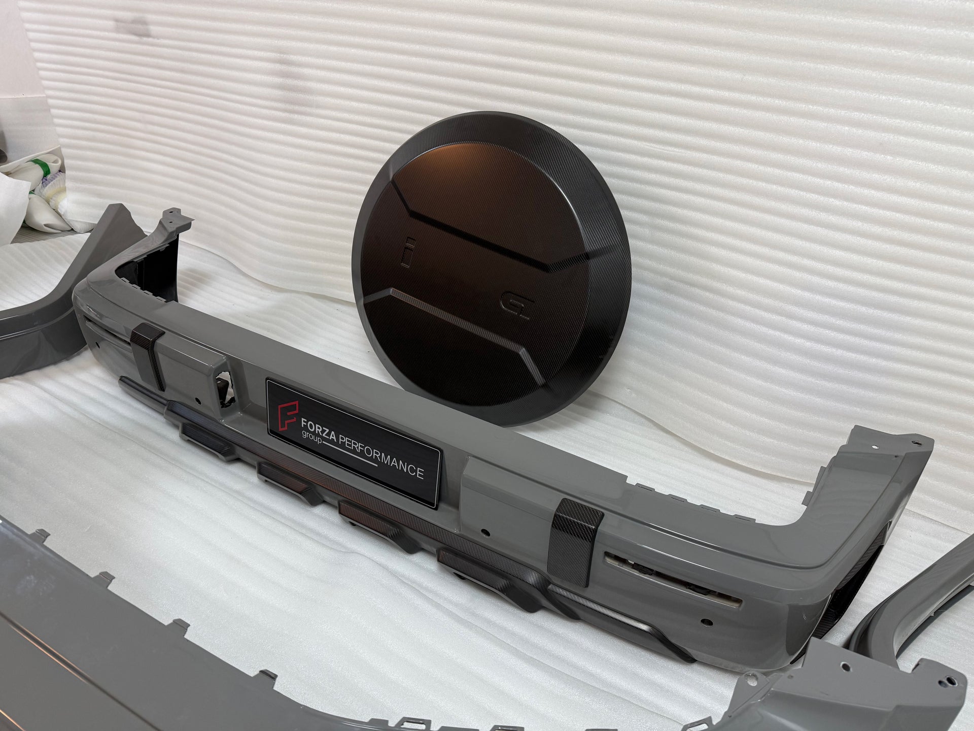 DRY CARBON BODY KIT for MERCEDES BENZ G-CLASS W465 G63 G550 G500 G350 2024+

Set includes:

Front Bumper Assembly
Front Bumper Air Vents Cover
DRL LED Lights
Front Fender Trim
Fender Flares
Side Skirts
Exhaust System
Exhaust Tips
Spare Tire Cover
Rear Bumper

Rear Bumper Trims
Rear Diffuser

Material: Dry Carbon

NOTE:&nbsp;Professional installation is required.

Why “Contact Us for Pricing”?

We don’t display fixed prices because our goal is to offer you the most competitive deal possible. Product costs of