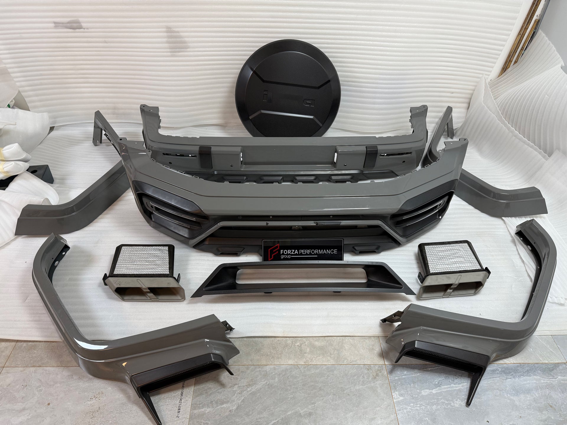 DRY CARBON BODY KIT for MERCEDES BENZ G-CLASS W465 G63 G550 G500 G350 2024+

Set includes:

Front Bumper Assembly
Front Bumper Air Vents Cover
DRL LED Lights
Front Fender Trim
Fender Flares
Side Skirts
Exhaust System
Exhaust Tips
Spare Tire Cover
Rear Bumper

Rear Bumper Trims
Rear Diffuser

Material: Dry Carbon

NOTE:&nbsp;Professional installation is required.

Why “Contact Us for Pricing”?

We don’t display fixed prices because our goal is to offer you the most competitive deal possible. Product costs of