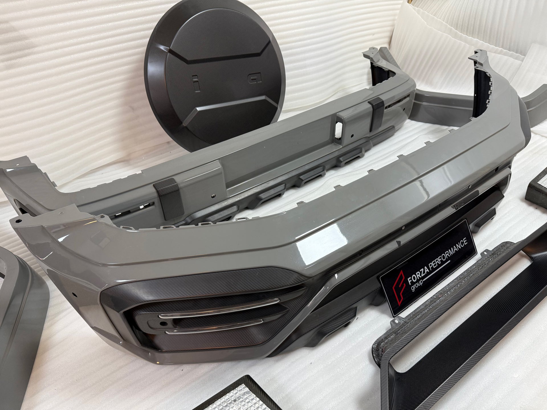 DRY CARBON BODY KIT for MERCEDES BENZ G-CLASS W465 G63 G550 G500 G350 2024+

Set includes:

Front Bumper Assembly
Front Bumper Air Vents Cover
DRL LED Lights
Front Fender Trim
Fender Flares
Side Skirts
Exhaust System
Exhaust Tips
Spare Tire Cover
Rear Bumper

Rear Bumper Trims
Rear Diffuser

Material: Dry Carbon

NOTE:&nbsp;Professional installation is required.

Why “Contact Us for Pricing”?

We don’t display fixed prices because our goal is to offer you the most competitive deal possible. Product costs of