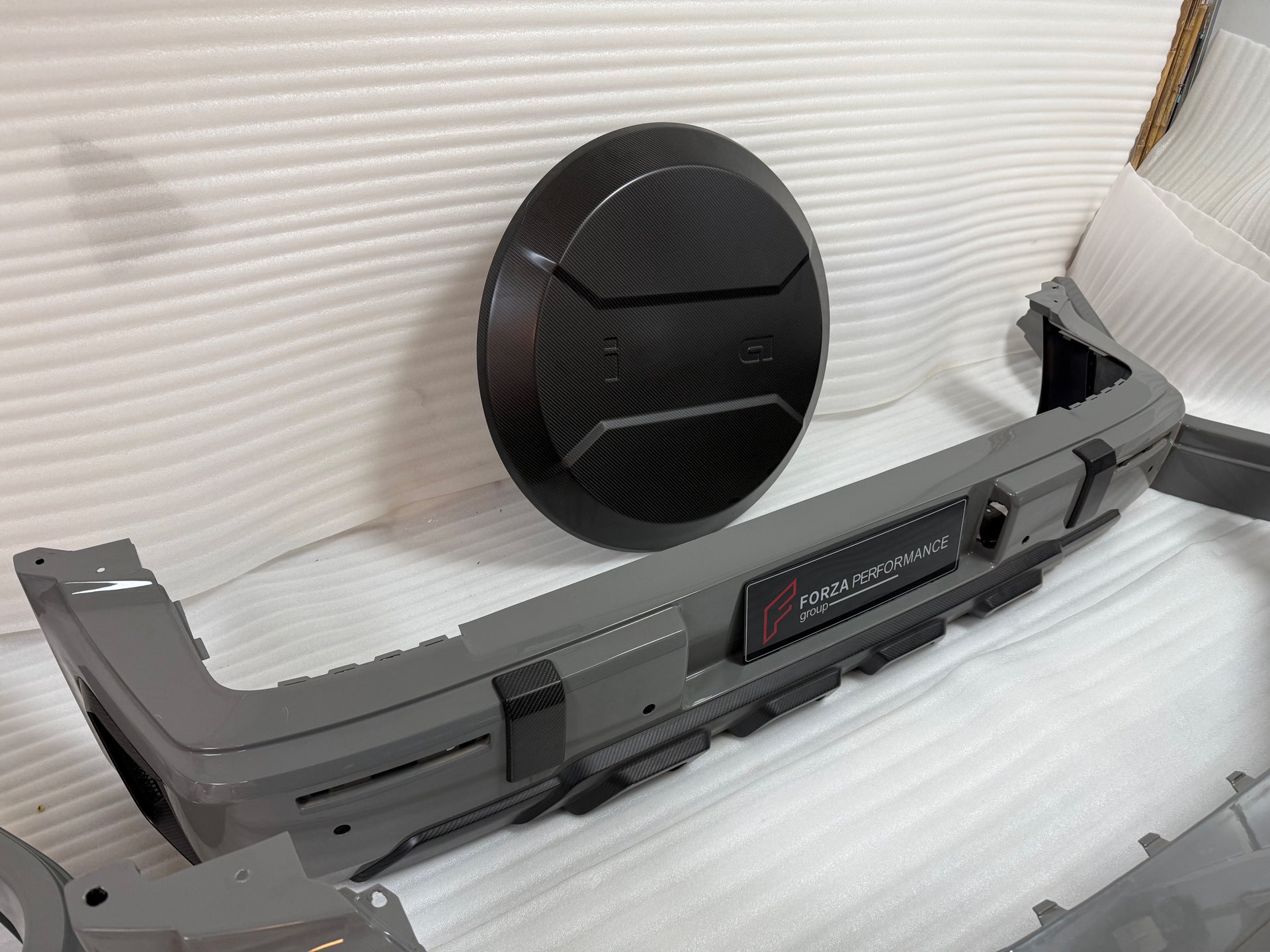 DRY CARBON BODY KIT for MERCEDES BENZ G-CLASS W465 G63 G550 G500 G350 2024+

Set includes:

Front Bumper Assembly
Front Bumper Air Vents Cover
DRL LED Lights
Front Fender Trim
Fender Flares
Side Skirts
Exhaust System
Exhaust Tips
Spare Tire Cover
Rear Bumper

Rear Bumper Trims
Rear Diffuser

Material: Dry Carbon

NOTE:&nbsp;Professional installation is required.

Why “Contact Us for Pricing”?

We don’t display fixed prices because our goal is to offer you the most competitive deal possible. Product costs of