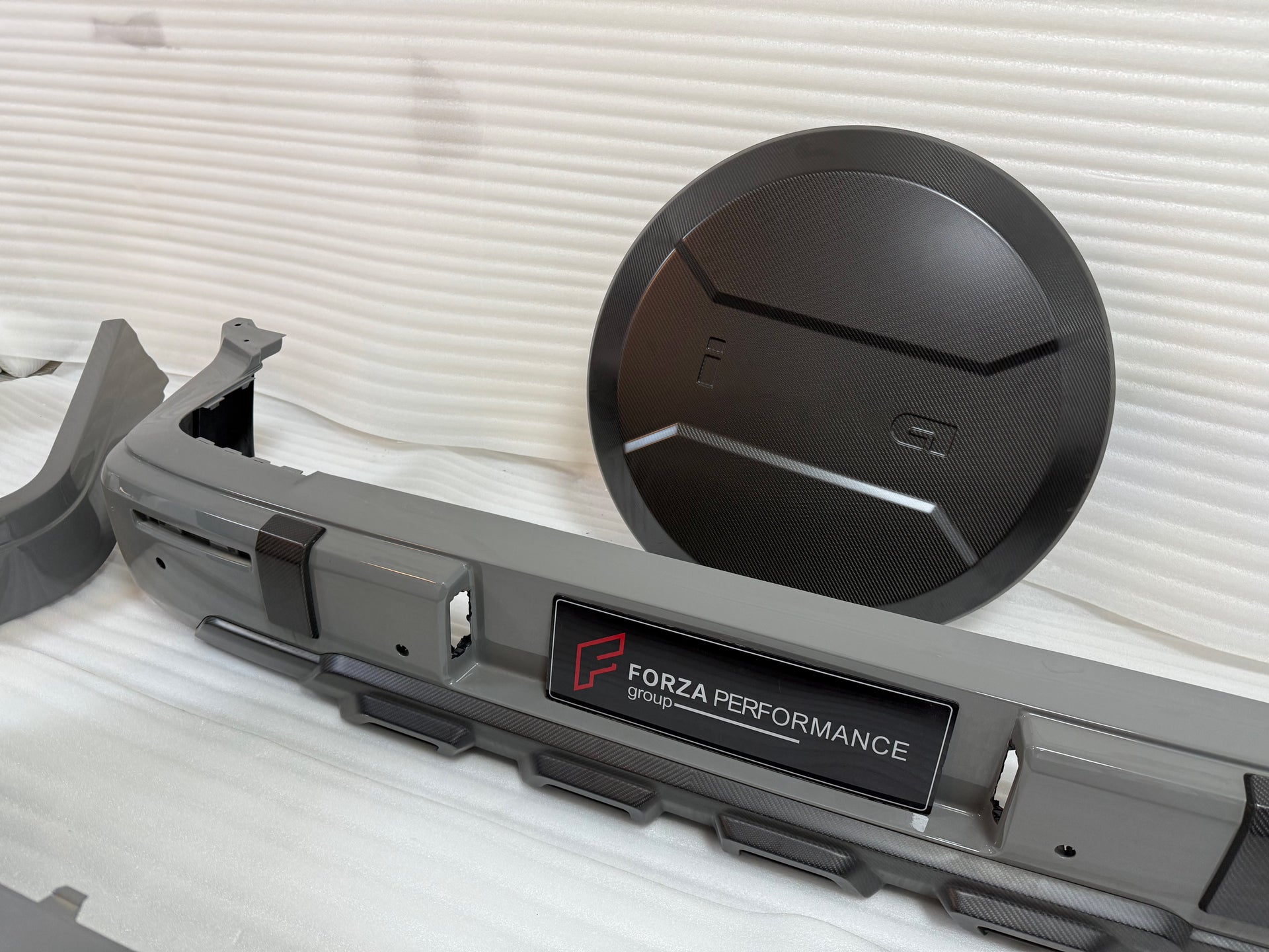 DRY CARBON BODY KIT for MERCEDES BENZ G-CLASS W465 G63 G550 G500 G350 2024+

Set includes:

Front Bumper Assembly
Front Bumper Air Vents Cover
DRL LED Lights
Front Fender Trim
Fender Flares
Side Skirts
Exhaust System
Exhaust Tips
Spare Tire Cover
Rear Bumper

Rear Bumper Trims
Rear Diffuser

Material: Dry Carbon

NOTE:&nbsp;Professional installation is required.

Why “Contact Us for Pricing”?

We don’t display fixed prices because our goal is to offer you the most competitive deal possible. Product costs of