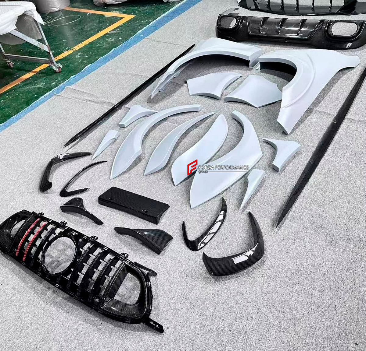 DRY CARBON BODY KIT for Mercedes Benz GT43 GT50 GT53 GT63 2018+
Set includes:

Front Bumper Assembly
Front Bumper Fins
License Plate
Front Splitters
Front Grille
Front Fenders
Side Skirts
Rear Fenders
Rear Diffuser
Rear Bumper Fins
Material: Dry Carbon

NOTE: Professional installation is required.