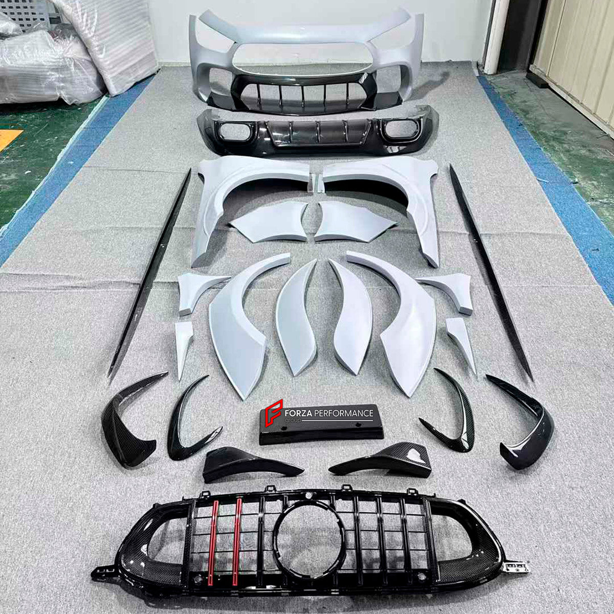 DRY CARBON BODY KIT for Mercedes Benz GT43 GT50 GT53 GT63 2018+
Set includes:

Front Bumper Assembly
Front Bumper Fins
License Plate
Front Splitters
Front Grille
Front Fenders
Side Skirts
Rear Fenders
Rear Diffuser
Rear Bumper Fins
Material: Dry Carbon

NOTE: Professional installation is required.