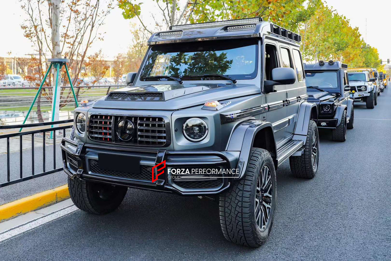 DRY CARBON BODY KIT for MERCEDES-BENZ W464 G63 4x4 G500 G550 2019 - 2022  Set includes:  Hood Front Grille Turn Signal Covers Side Fenders Side Trims Side Moldings Side Skirts Roof LED Bar Roof Rack Roof Ladder Spare Tire Holder Rear Bumper Reinforcement