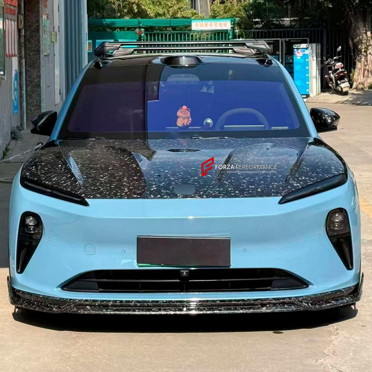 DRY CARBON BODY KIT for Nio ET5 ET5T Touring 2022+
Set includes:

Front Lip
Hood Bonnet
Side Skirts
Rear Diffuser
Material: Dry Carbon

NOTE: Professional installation is required.