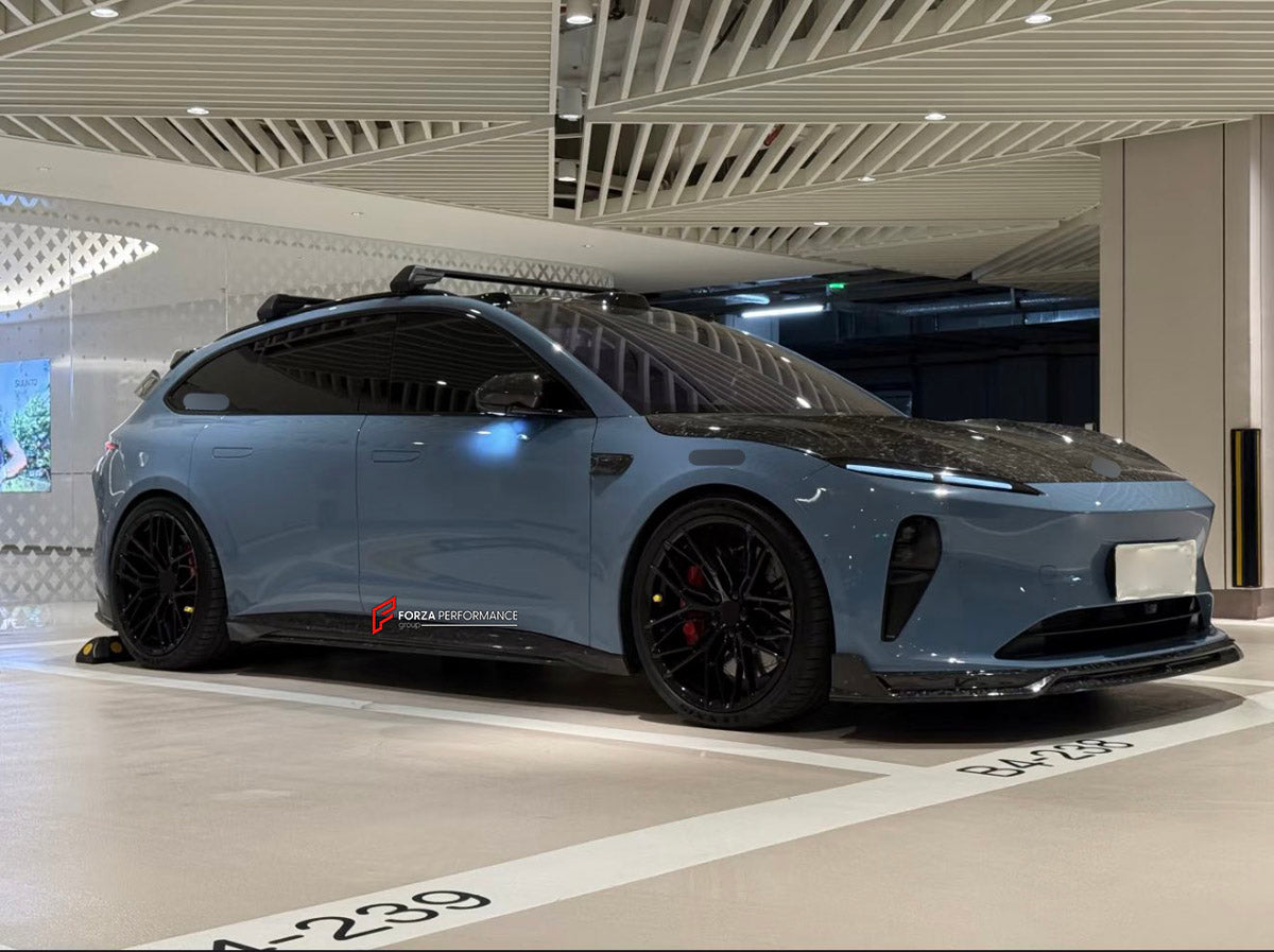 DRY CARBON BODY KIT for Nio ET5 ET5T Touring 2022+
Set includes:

Front Lip
Hood Bonnet
Side Skirts
Rear Diffuser
Material: Dry Carbon

NOTE: Professional installation is required.