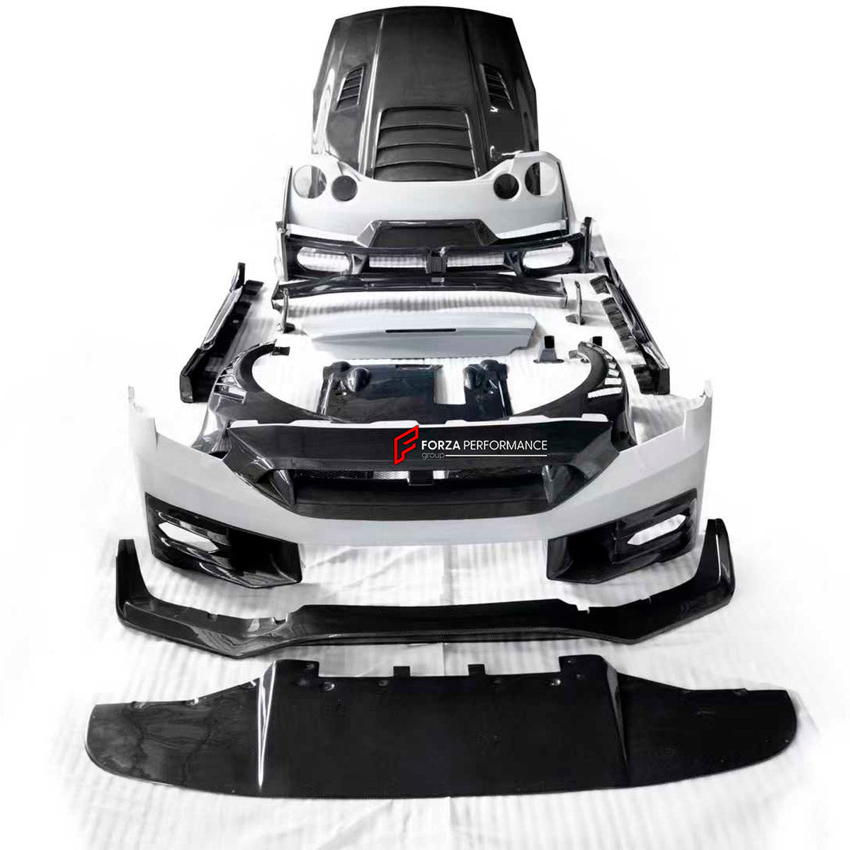 DRY CARBON BODY KIT for Nissan GT-R R35 2007 - 2016
Set includes:

Front Bumper
Front Lip
Front Canards
Hood Bonnet
Side Skirts
Rear Spoiler Wing
Trunk Lid
Rear Diffuser
Rear Bumper
Material: Dry Carbon

NOTE: Professional installation is required.