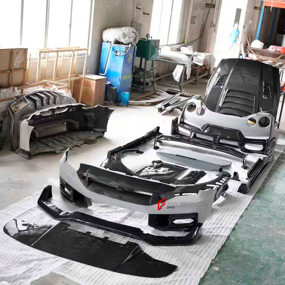 DRY CARBON BODY KIT for Nissan GT-R R35 2007 - 2016
Set includes:

Front Bumper
Front Lip
Front Canards
Hood Bonnet
Side Skirts
Rear Spoiler Wing
Trunk Lid
Rear Diffuser
Rear Bumper
Material: Dry Carbon

NOTE: Professional installation is required.