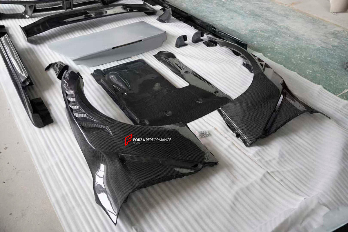 DRY CARBON BODY KIT for Nissan GT-R R35 2007 - 2016
Set includes:

Front Bumper
Front Lip
Front Canards
Hood Bonnet
Side Skirts
Rear Spoiler Wing
Trunk Lid
Rear Diffuser
Rear Bumper
Material: Dry Carbon

NOTE: Professional installation is required.
